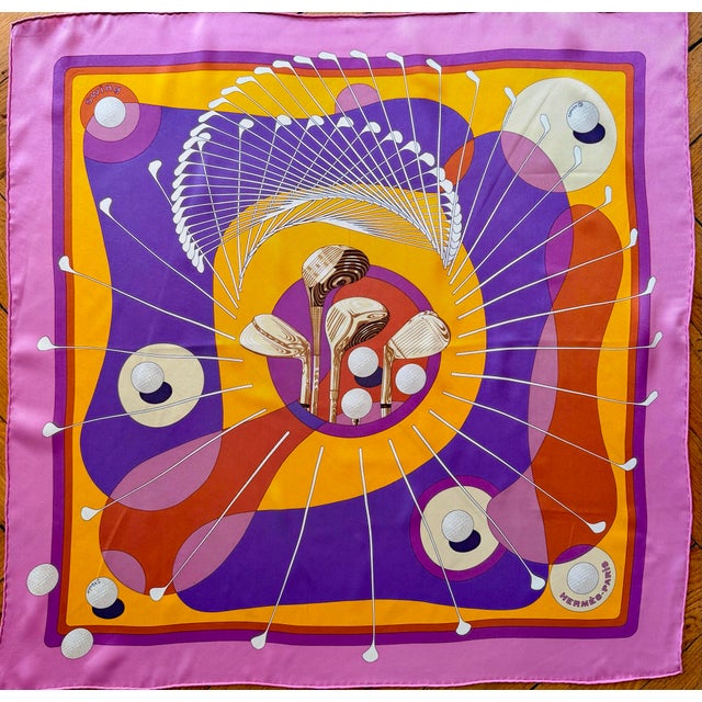Hermes Swing Silk Scarf This lovely scarf is an homage to the world of golf. Through a design, the swing is detailed in...