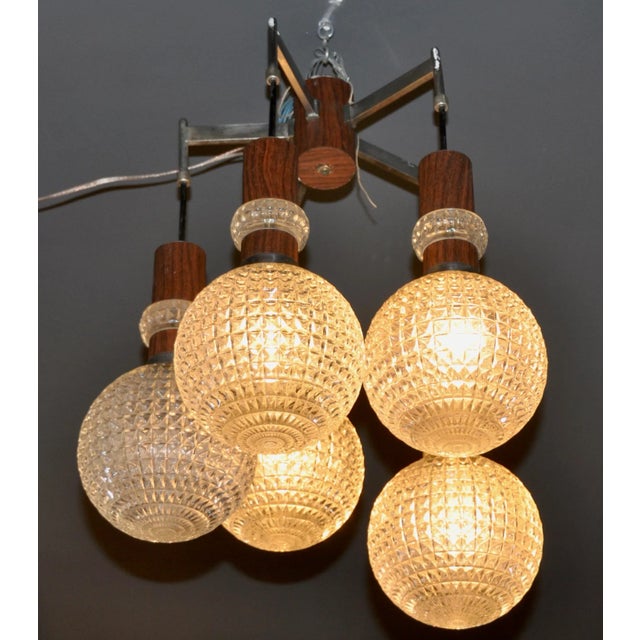 Ceiling Lamp with 5 Lights, in Good conditions. Designed 1960 to 1969 European Plug (up to 250V).The wiring of this item...