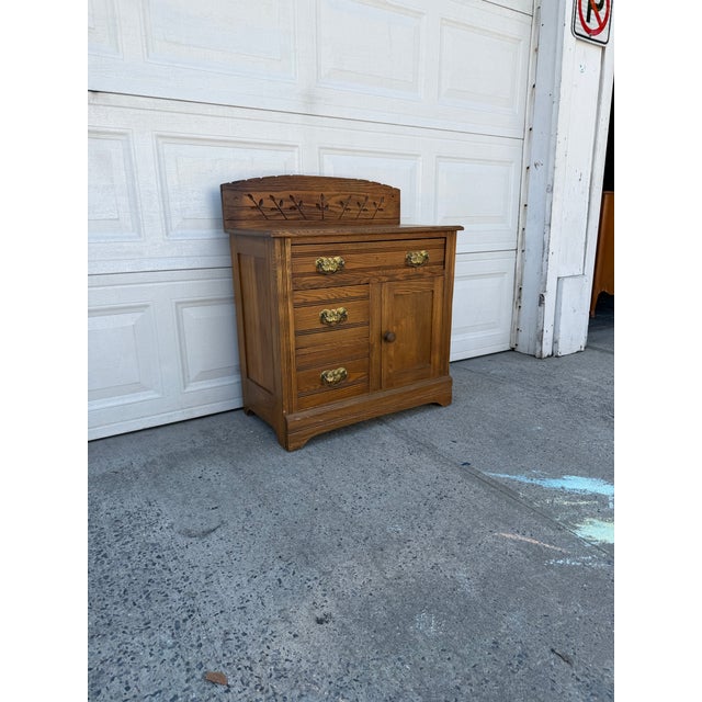 Victorian Antique Oak Washstand With Carved Backsplash, Cabinet and Brass Hardware For Sale - Image 3 of 12
