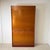 Stunning and mechanically ingenious mid-century tambour cabinet, a prime example of high-quality German office design. The...