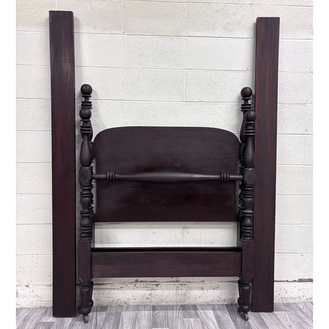 This is a gorgeous antique Victorian twin sized cannonball bed featuring oversized ball finials, elaborately turned four-...