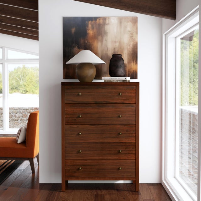 Elevate your space with the timeless charm and functional elegance of the Butler Specialty Company Nora 5 Drawer Tall...
