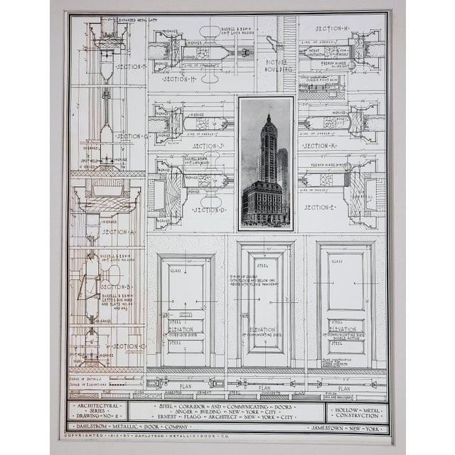 This piece is a beautiful lithograph of details from the Singer Building of N.Y.C., once the tallest building in the...