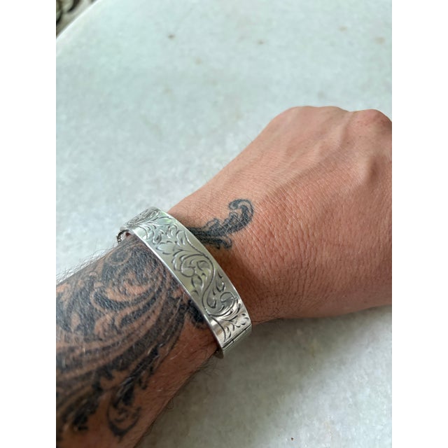 Wonderful Antique sterling silver bracelet with hinged clasp and etched design.