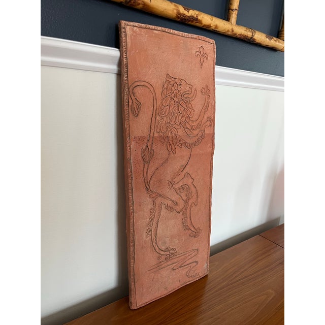 Great terracotta plaque with etched Lion. Lion in all its splendor etched into terracotta placard. Nicely detailed with a...