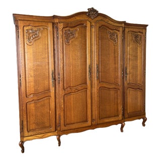 Vintage French Louis XVI Style Carved Oak 4-Door Armoire For Sale