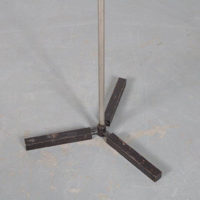 An eye-catching adjustable floor lamp by Dutch manufacturer Anvia in their highly recognizable style! This lamp has a...