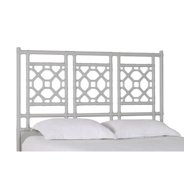 This headboard features classic Rattan design in a geometric pattern. Constructed of solid rattan and hand bound with...