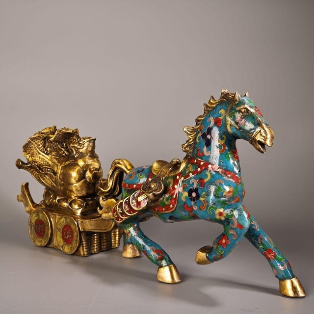 This striking vintage cloisonne enamel sculpture depicts a horse pulling a cart, a traditional symbol of success, wealth,...