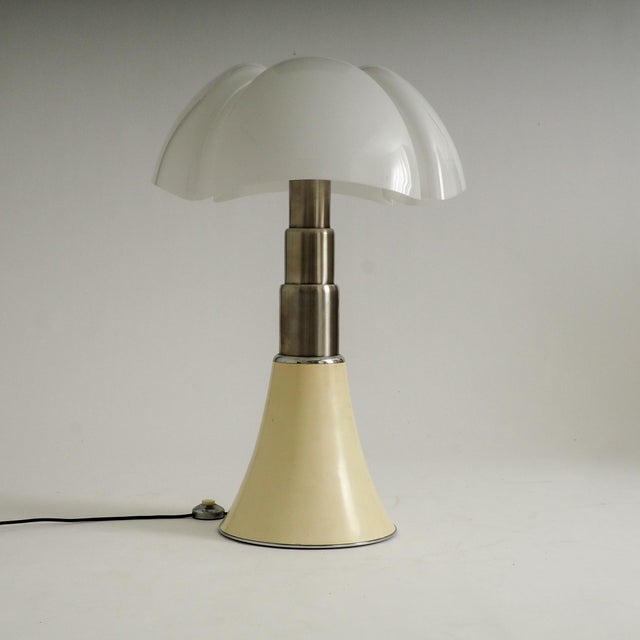 An authentic icon of Italian mid-century design: the large Pipistrello Table Lamp (Modello 620), designed by Gae Aulenti...