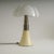 An authentic icon of Italian mid-century design: the large Pipistrello Table Lamp (Modello 620), designed by Gae Aulenti...