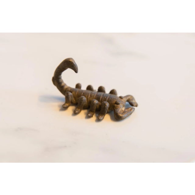 :: Vintage handmade African dark bronze scorpion. Circa mid 20th century and possibly older, this piece has such...