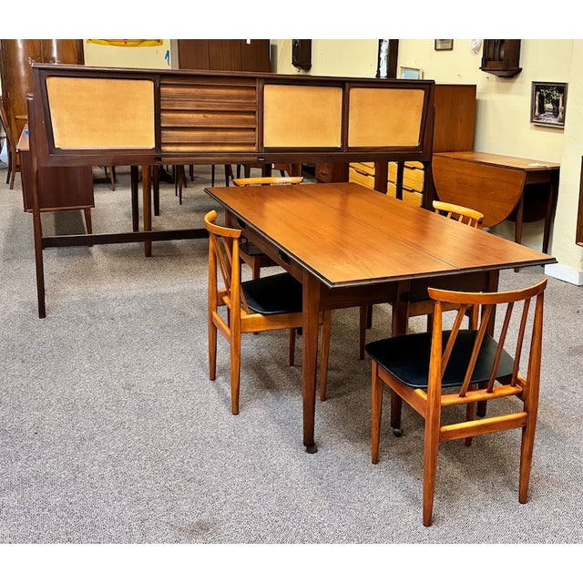 Iconic European Mid Century Modern Teak & Wicker Nesting Dining Suite W/ Credenza, Dining Table & Four Chairs c.1960 For Sale - Image 15 of 18