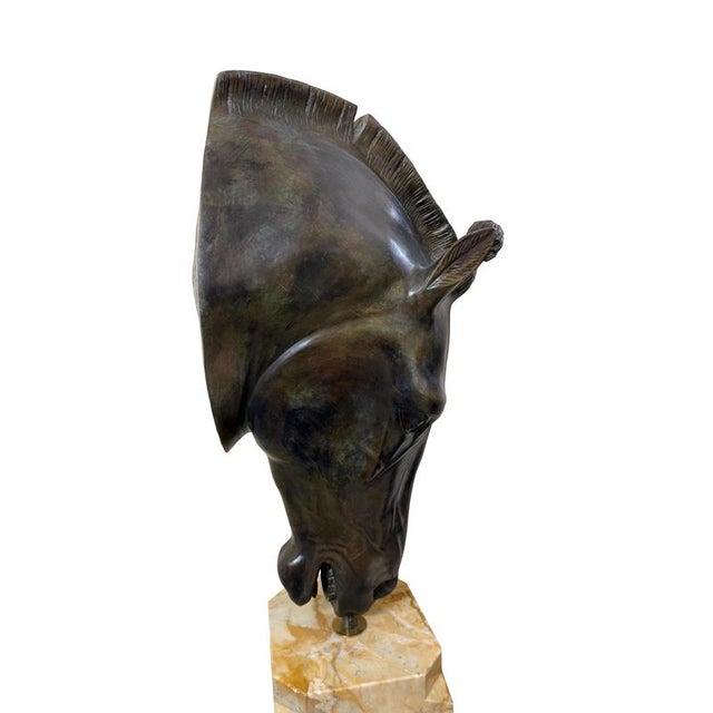 Dimensions: 53 cm wide, 30 cm deep, 100 cm high. Bronze with a Siena yellow marble base. Leonardo da Vinci, the Florentine...