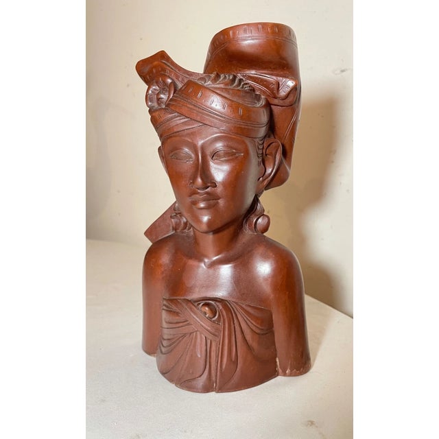 Up for sale is a wonderful antique hand carved wooden Balinese bust sculpture. It's carved by hand out of a very dense,...