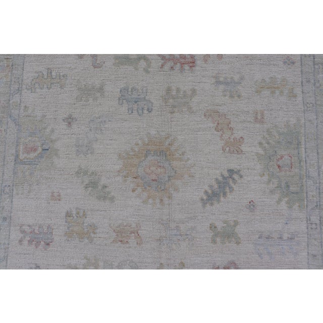Large Oushak Rug With Floral Motifs & Muted Colorful Tones on Neutral Background For Sale - Image 4 of 12