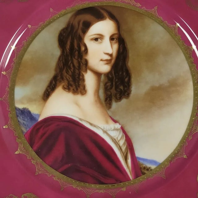 1950's dark raspberry and gold gilt porcelain JWK Bavaria West Germany plate featuring a portrait of a beautiful woman....