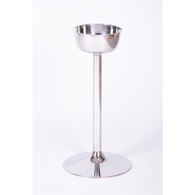 This metal pedestal originates from 1970s Czechoslovakia and reflects the influence of the functionalist aesthetics of the...