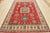 This traditional tribal geometric Caucasian Kazak rug is hand-knotted with an all-wool pile on a cotton foundation. This...