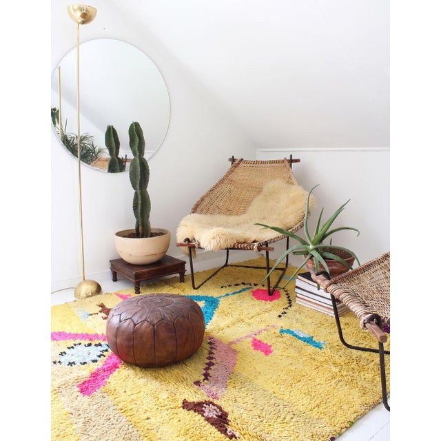 Boujad Rug | Handwoven Berber Wool Rug with Yellow Field and Floral Motifs This charming Boujad rug features a bright...