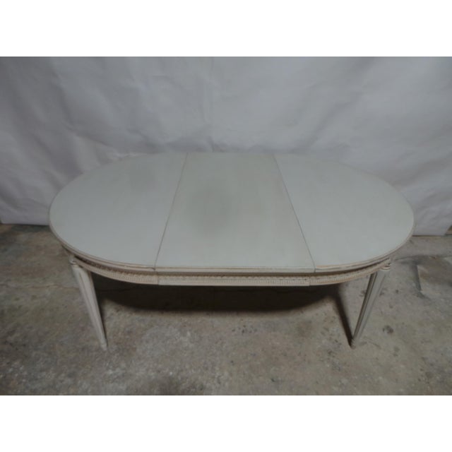 This is a very Rare Swedish Gustavian dining table. its a round table that has 1 leaf. its been restored and repainted...