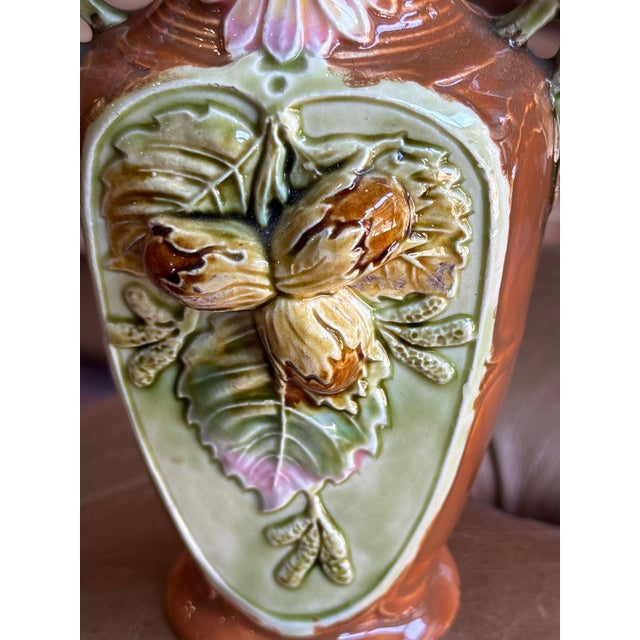 Antique French majolica pottery vase with a gorgeous and unusual acorn motif! Double handled. Such beautiful, vibrant...
