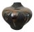 Add a touch of vintage elegance to your home decor with this beautiful Haeger black volcanic lava glaze pottery vase. Made...