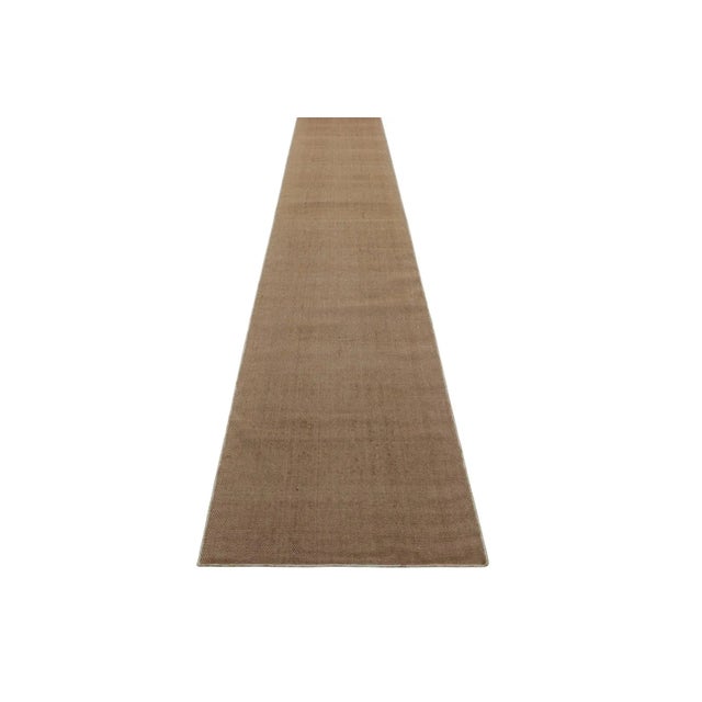 Handwoven in wool, this 2'7x10' extra-long contemporary runner rug is an exciting addition to the Modern rug collection by...