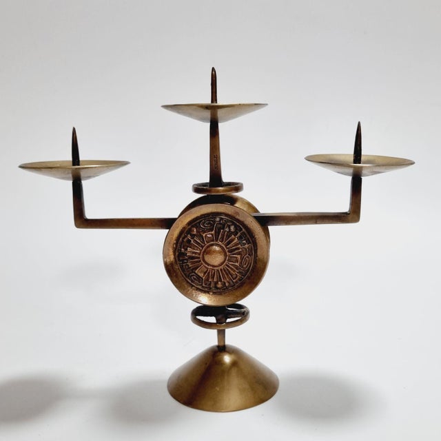 3-branch brass candlestick was created in the 1970s, by the Hungarian artist Gyula Szabó. Due to its industrial style, it...