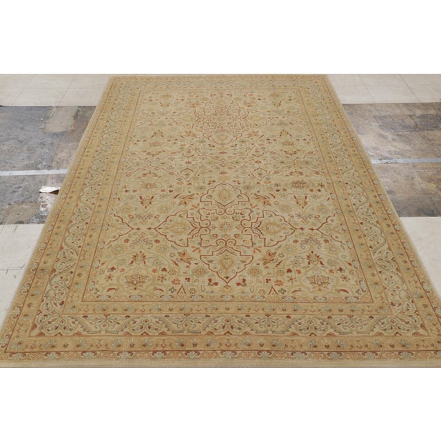 Hand-knotted in wool, this 6x9 rug is a gorgeous piece from a skilled partner loom now being unveiled for the first time...