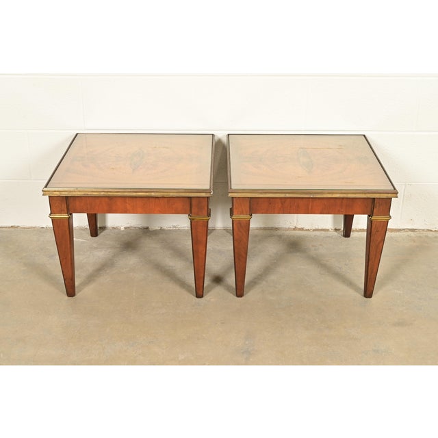A gorgeous pair of Neoclassical or French Regency Louis XVI style occasional side tables or tea tables By Baker Furniture...
