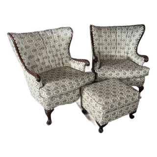 Vintage Mid-Century Upholstered Wingback Lounge Chairs With Matching Ottoman, Carved Wood Frame, Custom Upholstery. For Sale