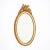 Oval mirror from France featuring a hand-carved frame. The frame, made of wood, supports a central oval mirror original to...
