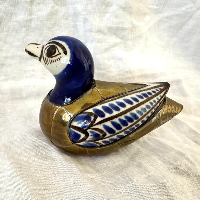 Vintage Mexican Tonala Pottery and Brass Duck Figurine with a blue-painted ceramic head and hand painted wing details set...