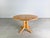 We are offering for sale a beautiful extendable dining table by Rainer Daumiller from the 1960s. with its two extension...