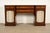 A beautiful English Regency or Georgian style sideboard, buffet, credenza, or bar cabinet By Kittinger USA, Circa 1960s...