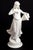 "The Water Carrier" White Marble Sculpture, depicting a standing figure holding a water vessel, on a socle. 22" H x 7" W x...