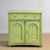 Pine sideboard from around 1910. The cabinet has its original paint with a beautiful patina. The cabinet has a well-...