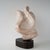 Vintage late 20th century (1991) abstract pink alabaster sculpture on a black base. Sculpture is signed by artist, David...