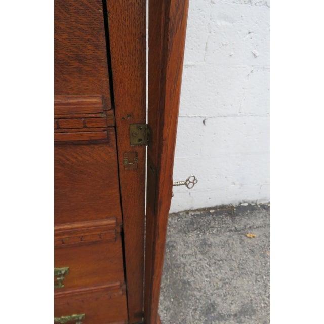 Brown Late 1800s Carved Tiger Oak Tall Chest of Drawers With Working Key For Sale - Image 8 of 11