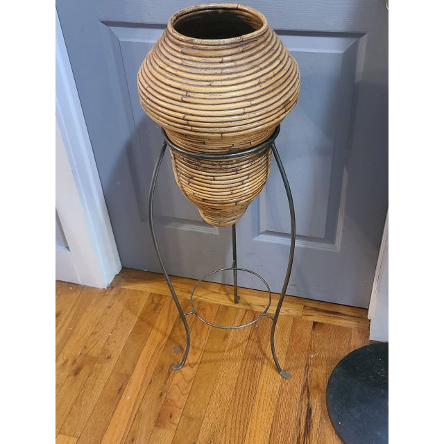 This Vintage Pencil Reed Bamboo Italian Crespi Style Vase on Wrought Iron Stand stands at 38 inches tall, making it a...