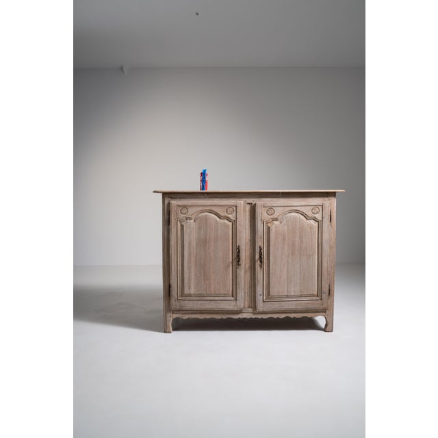 Hailing from 19th-century provincial France, this stately oak buffet embodies the restrained elegance and honest...