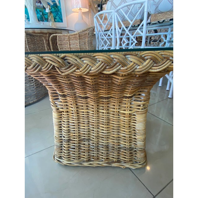 Lovely vintage pair of Wicker Works braided side end tables with new glass top. Glass tops have been newly cut. Natural...