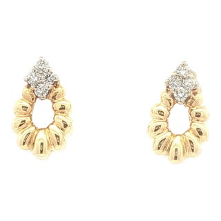 Late 20th Century Pair of Small Gold Ribbed Doorknocker Earrings For Sale