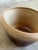 Vintage 1960s Mid-Century Modern studio ceramic bowl features a captivating two-tone ombré design with an organic,...