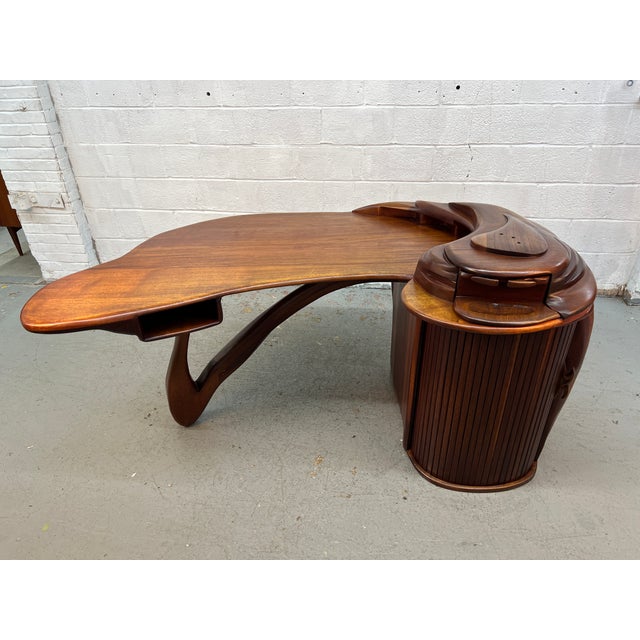 Striking and highly sculptural Brazilian Mid-Century Modern executive desk featuring an extraordinary combination of...