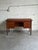This vintage freestanding executive workstation features an expansive rectangular top paired with dual drawer pedestals...