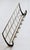 A sculptural, functional piece of mid-century design from the 1950s, space-saving and practical. Made in Austria. This...