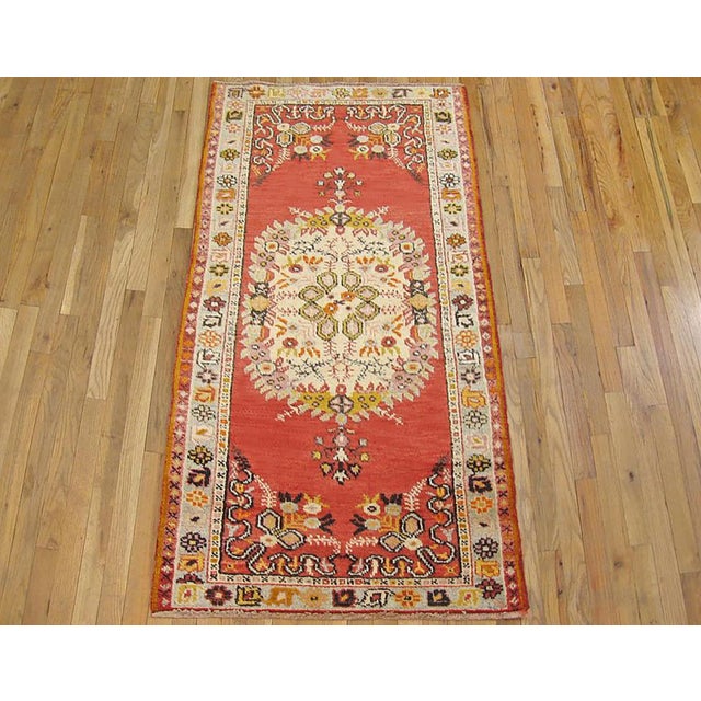 Vintage Turkish Oushak Decorative Oriental Carpet, Runner size, with Soft red Field A gorgeous vintage Turkish Oushak...