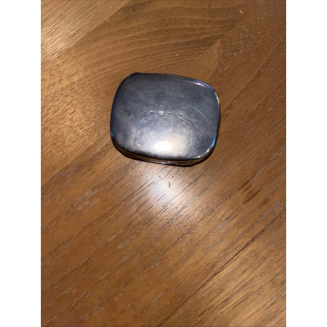 This is a vintage sterling silver pillbox from tiffany & co